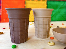 Load image into Gallery viewer, ice cream cones, biodegradable ice cream cones, nature based toys, 3D printed, sensory play, sensory activity, mud kitchen, flisat table, play inspiration, montessori, homeschool, preschool, classroom, kinetic sand, playdough, play dough, invitation play