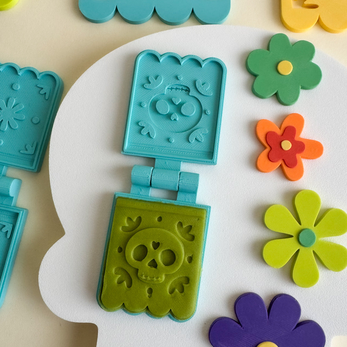 Colorful 3D-Printed Papel Picado Banner and Playdough Bio Molds by WooBeWee™