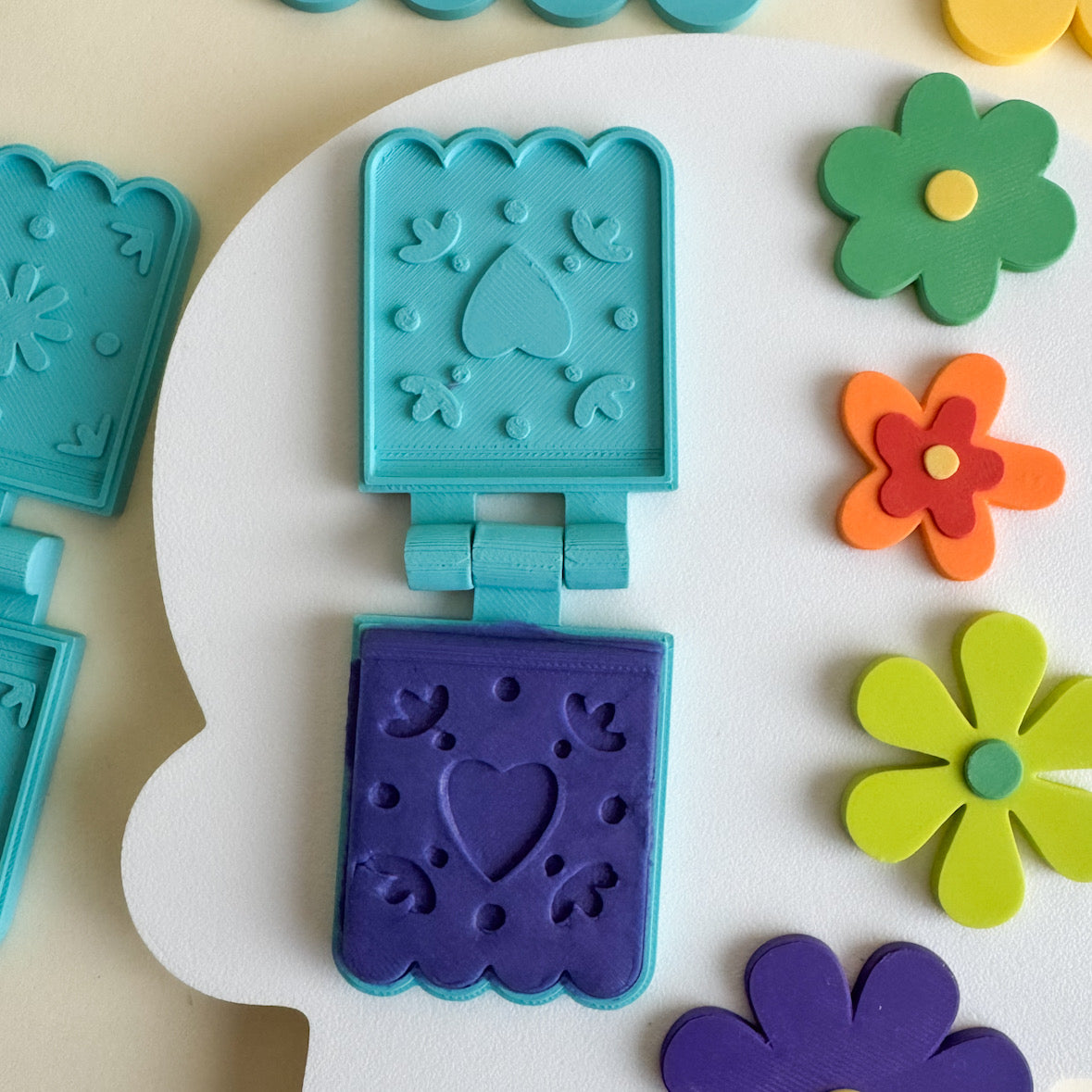 Colorful 3D-Printed Papel Picado Banner and Playdough Bio Molds by WooBeWee™